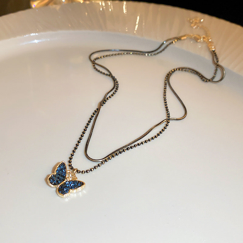 Midnight Black Butterfly Necklace - Wings illuminated by moonlight - VitriumJewels