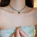 Midnight Black Butterfly Necklace - Wings illuminated by moonlight - VitriumJewels