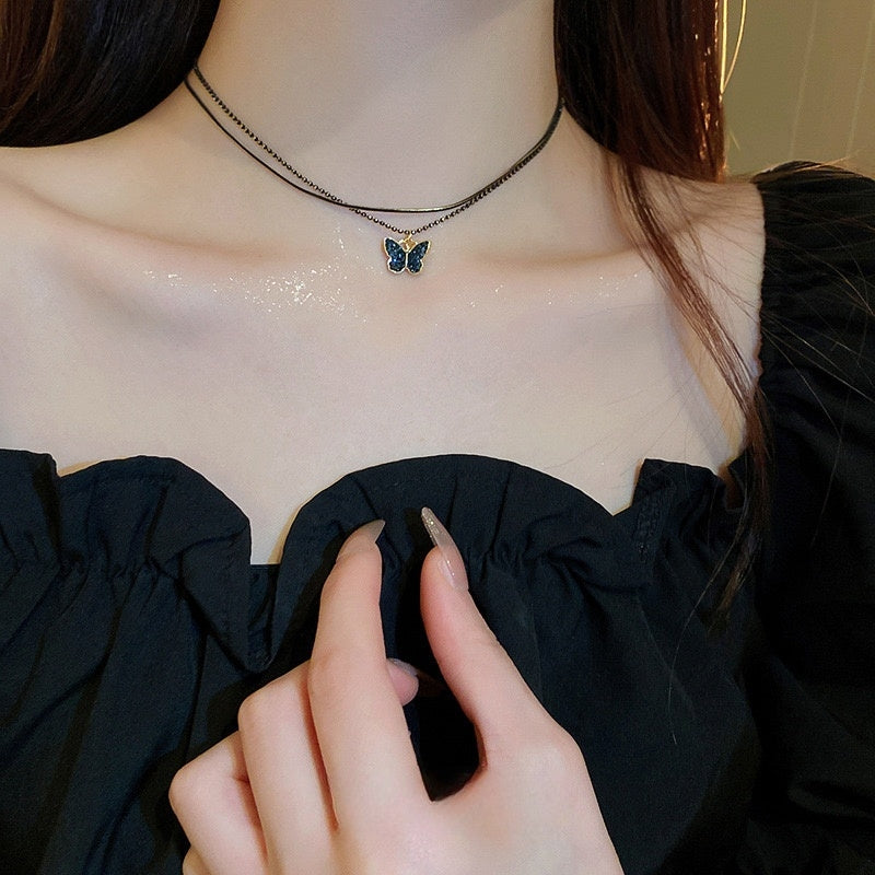 Midnight Black Butterfly Necklace - Wings illuminated by moonlight - VitriumJewels