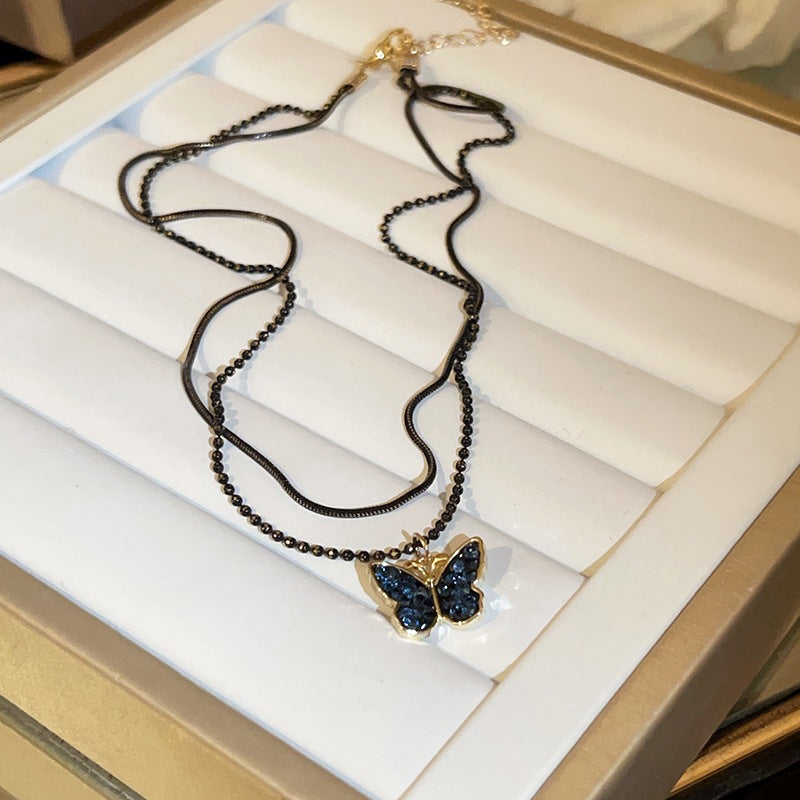 Midnight Black Butterfly Necklace - Wings illuminated by moonlight - VitriumJewels