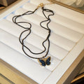 Midnight Black Butterfly Necklace - Wings illuminated by moonlight - VitriumJewels